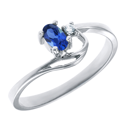 JCX302165: Created Blue Sapphire 5x3 oval (September birthstone) set in 10kt white gold ring with .02ct round diamond accent.