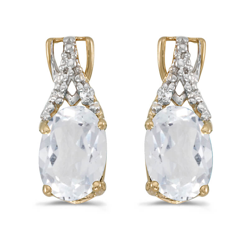 JCX2057: These 14k yellow gold oval white topaz and diamond earrings feature 7x5 mm genuine natural white topazs with a 1.84 ct total weight and sparkling diamond accents.