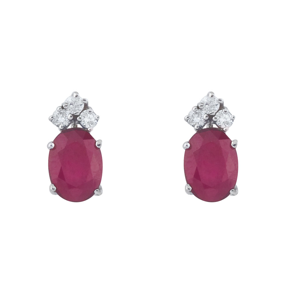 JCX2242: These 6x4 mm oval shaped ruby earrings are set in beautiful 14k white gold and feature .12 total carat diamonds.