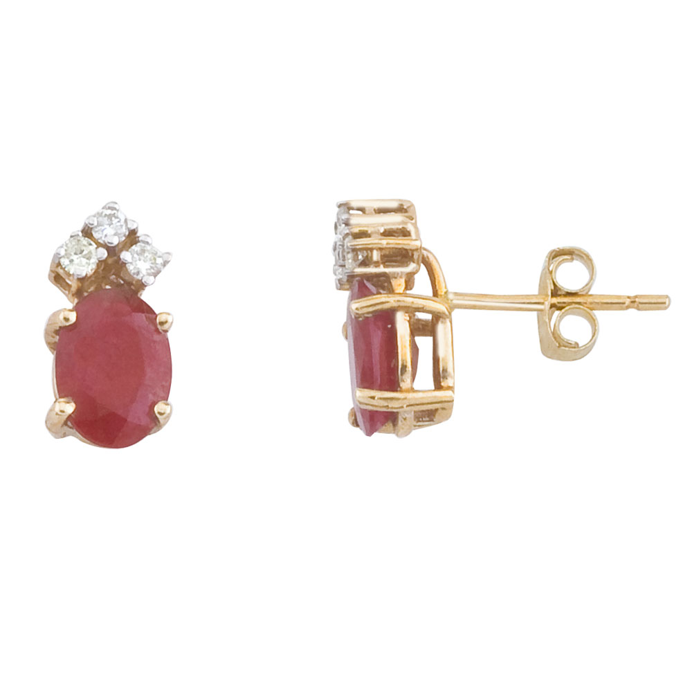 JCX2245: These 7x5 mm oval shaped ruby earrings are set in beautiful 14k yellow gold and feature .12 total carat diamonds.