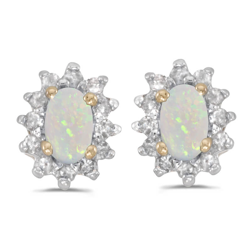 JCX2354: These 14k yellow gold oval opal and .25 ct diamond earrings feature 5x3 mm genuine natural opals with a 0.16 ct total weight.