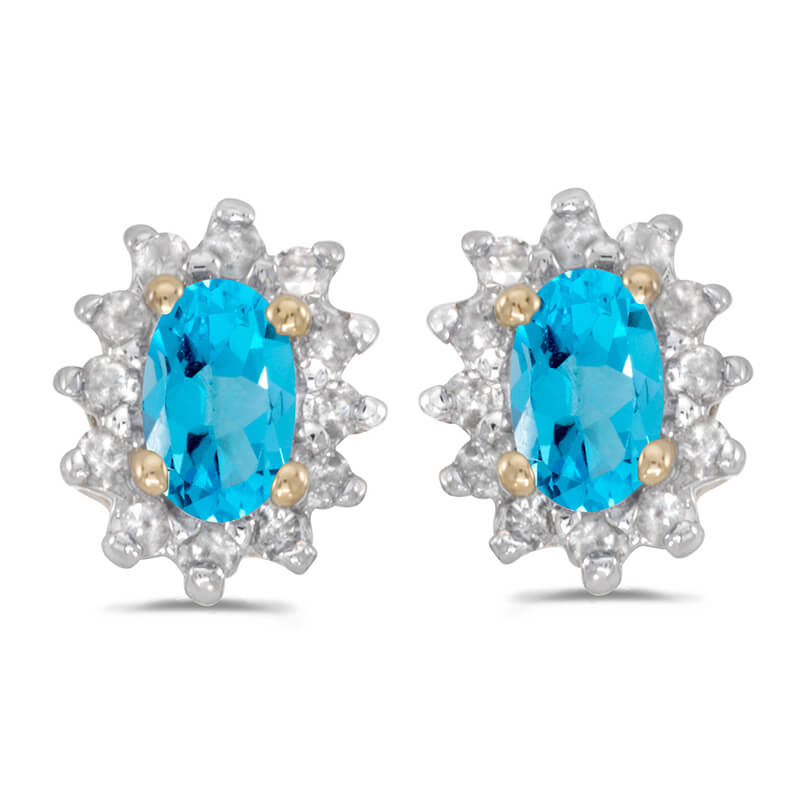 JCX2356: These 14k yellow gold oval blue topaz and .25 ct diamond earrings feature 5x3 mm genuine natural blue topazs with a 0.38 ct total weight.