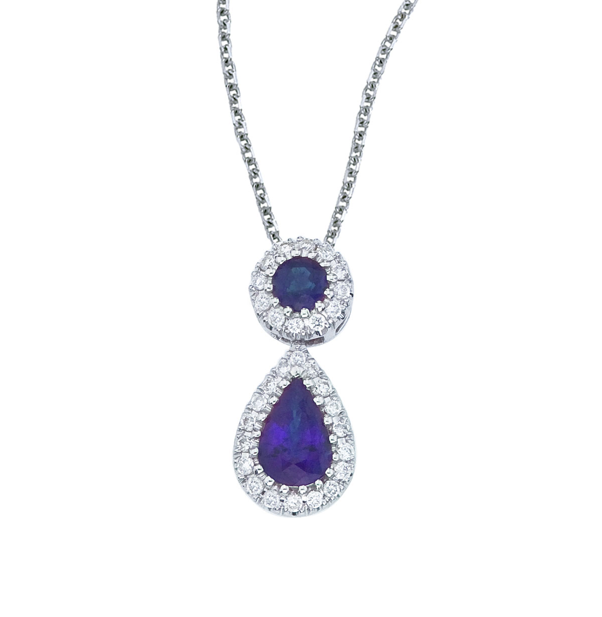 JCX2568: This beautiful 14k white gold pendant features a 6x4 mm sapphire dangling from a 2.5 mm round sapphire  all surrounded by .12 carats of shimmering diamonds.