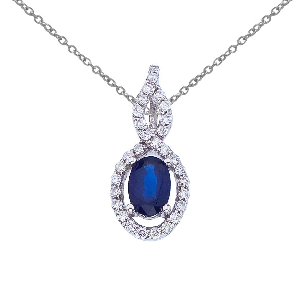 JCX2580: Luminous 6x4 mm sapphire pendant surrounded by .18 total ct diamonds set in 14k white gold.