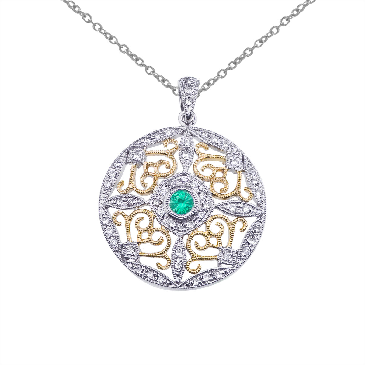 JCX2584: This pendant features a beautiful and intricate 14k two tone gold filigree design with a 4 mm emerald and .31 total ct diamonds.