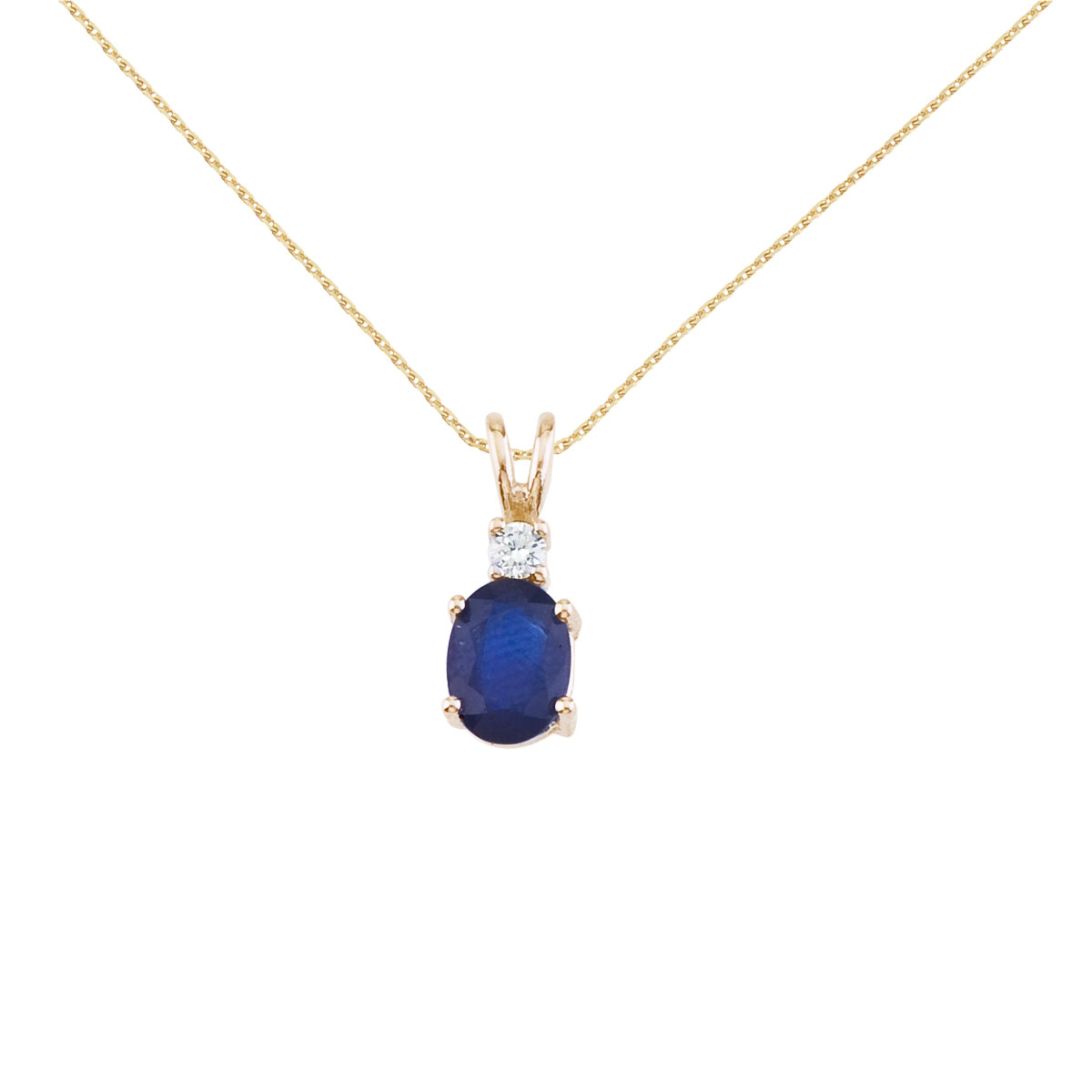 JCX2689: 7x5 mm natural sapphire and diamond pendant set in 14k yellow gold.