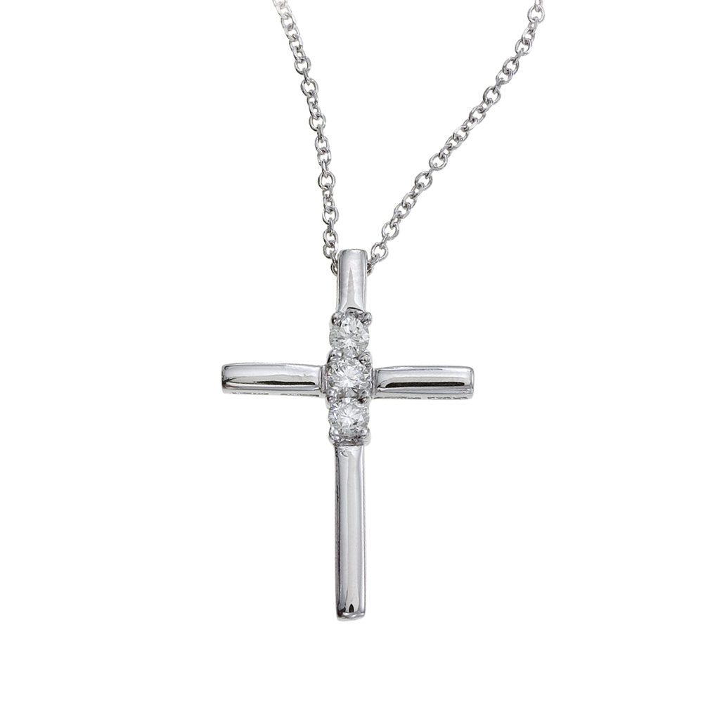 JCX2796: 14k white gold cross featuring .24 total ct diamonds. A fashionable take on a classic design.