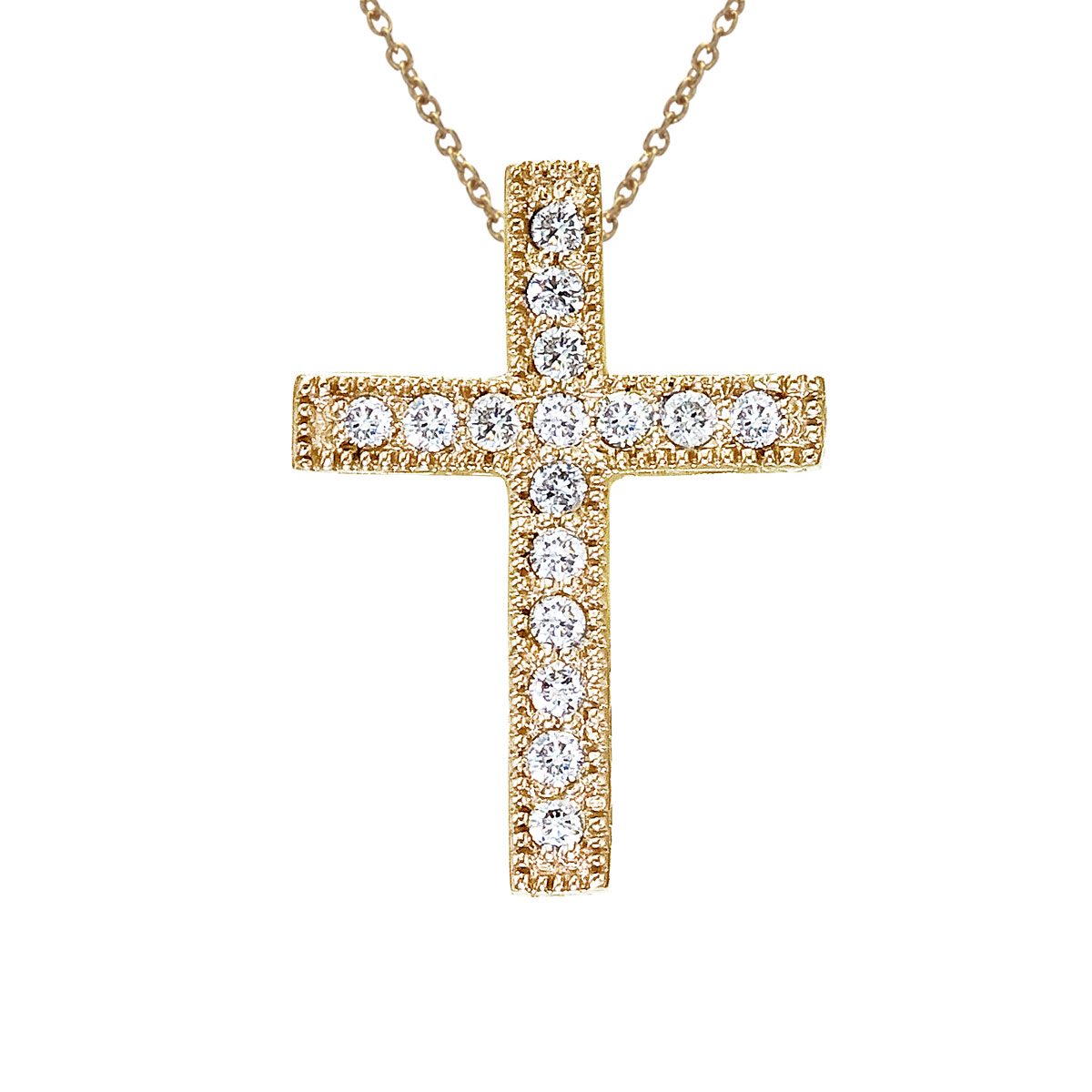 .16 ct diamond cross pendant set in 14k yellow gold.
