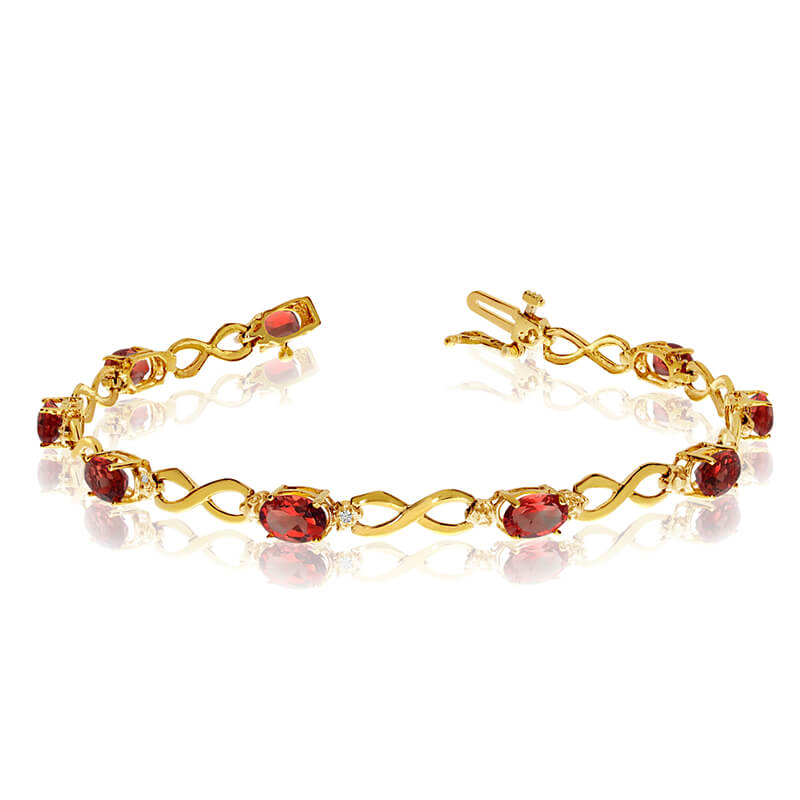 JCX3085: This 10k yellow gold oval garnet and diamond bracelet features nine 6x4 mm stunning natural garnets with a 4.23 ct total gem weight.