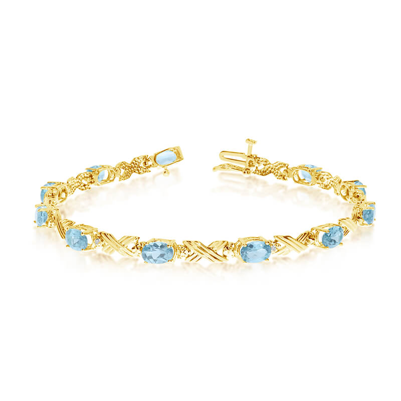 This 10k yellow gold oval aquamarine and diamond bracelet features eleven 6x4 mm stunning natural aquamarine stones with a 3.19 ct total gem weight.