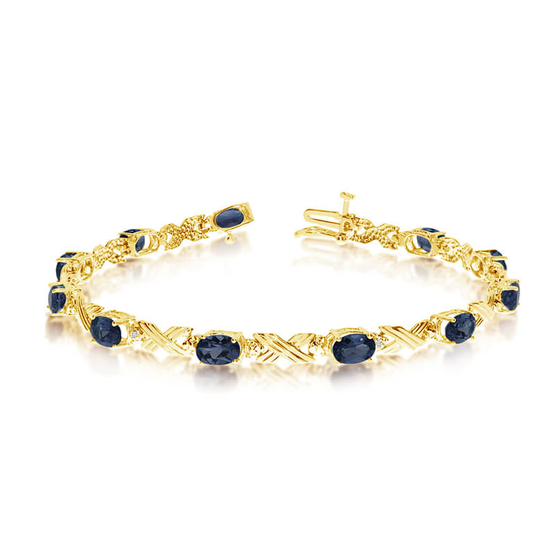 JCX3135: This 10k yellow gold oval sapphire and diamond bracelet features eleven 6x4 mm stunning natural sapphire stones with a 4.29 ct total gem weight.