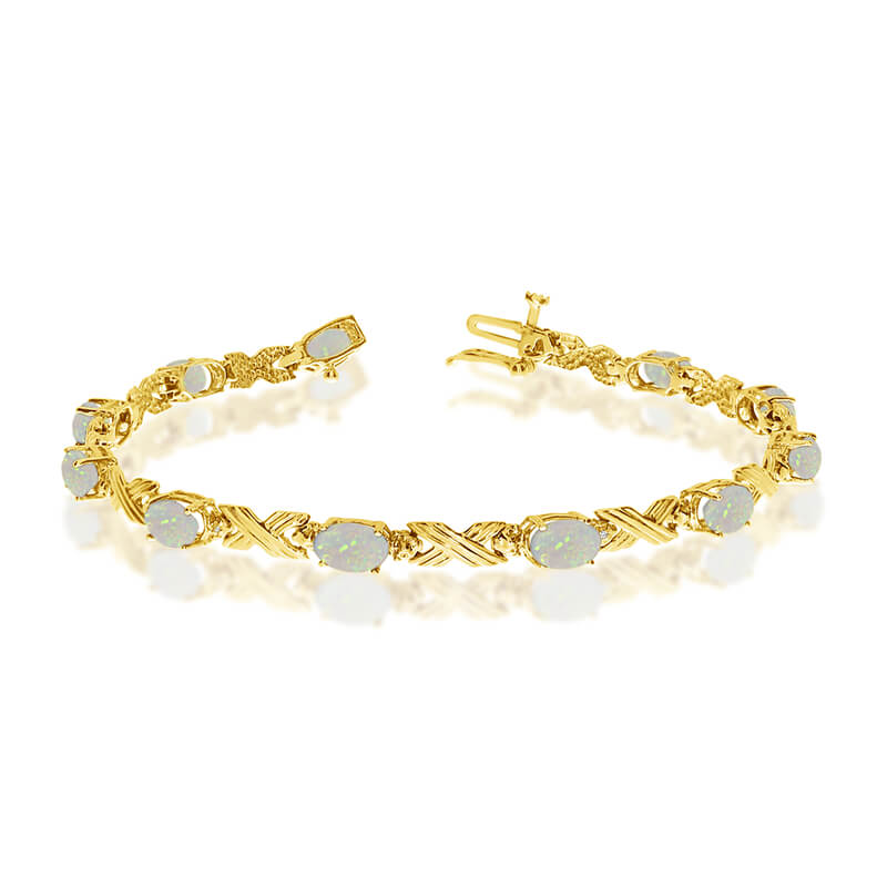 JCX3136: This 10k yellow gold oval opal and diamond bracelet features eleven 6x4 mm stunning natural opal stones with a 2.09 ct total gem weight.