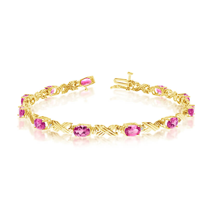 JCX3139: This 10k yellow gold oval pink topaz and diamond bracelet features eleven 6x4 mm stunning natural pink topaz stones with a 4.73 ct total gem weight.