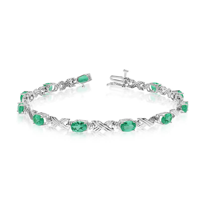 JCX3142: This 10k white gold oval emerald and diamond bracelet features eleven 6x4 mm stunning natural emerald stones with a 3.41 ct total gem weight.