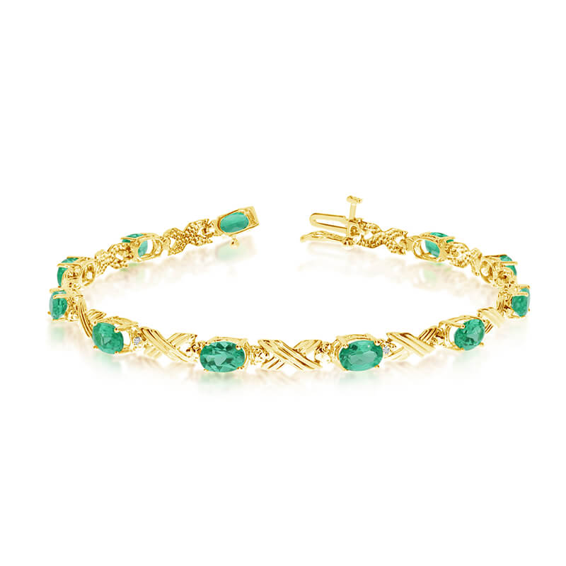 JCX3153: This 14k yellow gold oval emerald and diamond bracelet features eleven 6x4 mm stunning natural emerald stones with a 3.41 ct total gem weight.
