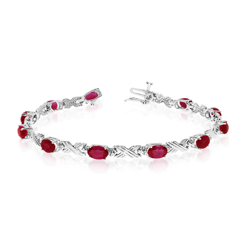 This 14k white gold oval garnet and diamond bracelet features eleven 6x4 mm stunning natural garnet stones with a 5.17 ct total gem weight.