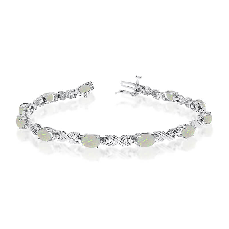 JCX3168: This 14k white gold oval opal and diamond bracelet features eleven 6x4 mm stunning natural opal stones with a 2.09 ct total gem weight.
