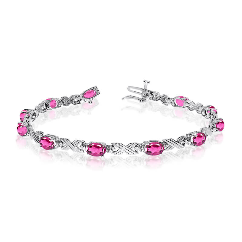 JCX3171: This 14k white gold oval pink topaz and diamond bracelet features eleven 6x4 mm stunning natural pink topaz stones with a 4.73 ct total gem weight.