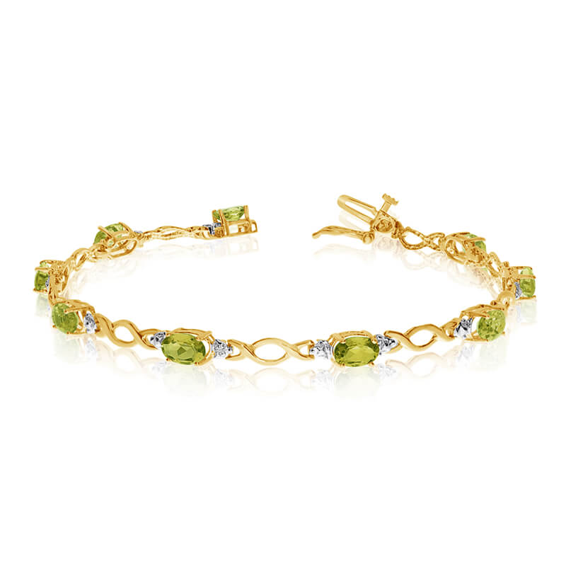 JCX3177: This 10k yellow gold oval peridot and diamond bracelet features ten 6x4 mm stunning natural peridot stones with 4.00 ct total gem weight.