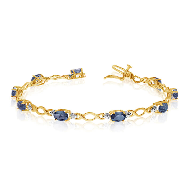 JCX3192: This 14k yellow gold oval sapphire and diamond bracelet features ten 6x4 mm stunning natural sapphire stones with 3.90 ct total gem weight.