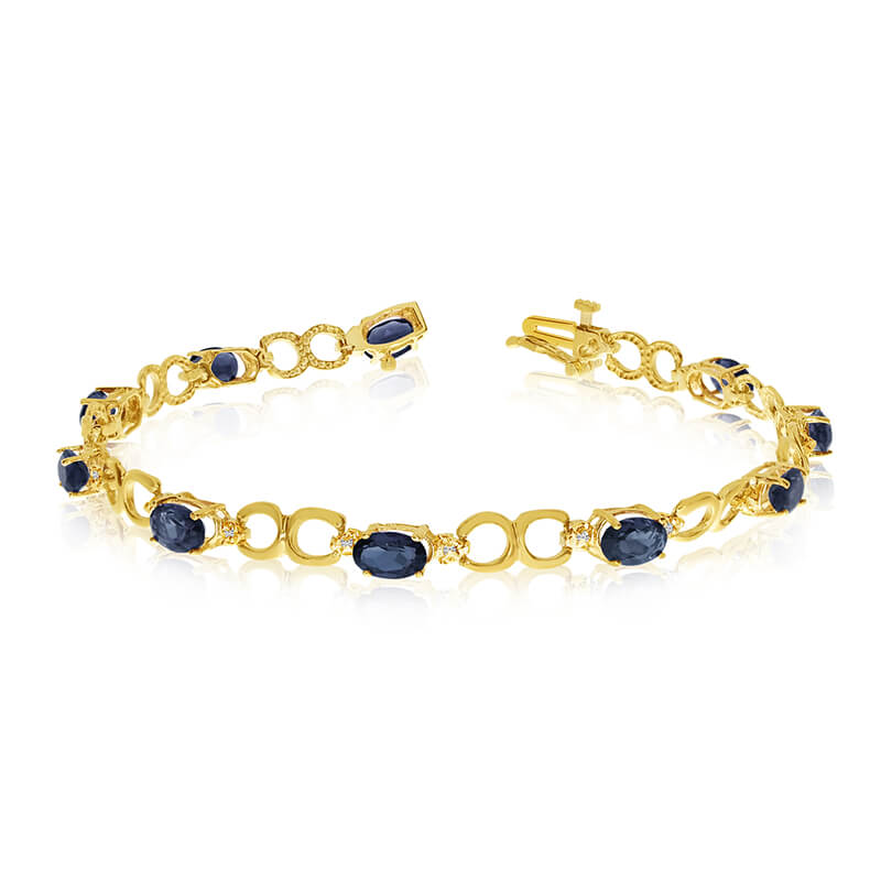JCX3228: This 14k yellow gold oval sapphire and diamond bracelet features ten 6x4 mm stunning natural sapphire stones with 3.90 ct total gem weight.