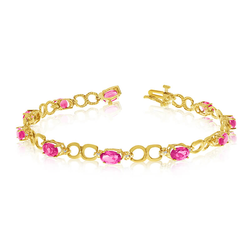 This 14k yellow gold oval pink topaz and diamond bracelet features ten 6x4 mm stunning natural pink topaz stones with a 4.30 ct total gem weight.