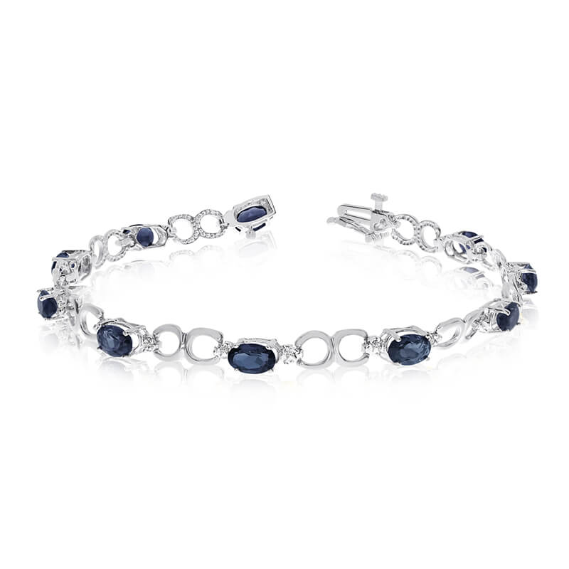 This 14k white gold oval sapphire and diamond bracelet features ten 6x4 mm stunning natural sapphire stones with 3.90 ct total gem weight.