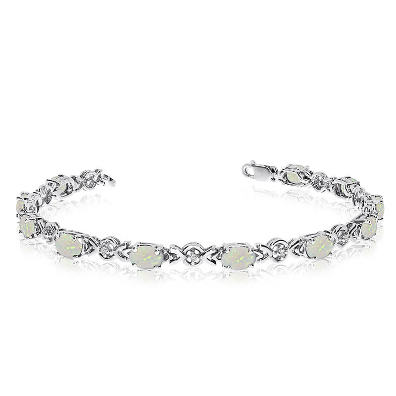 JCX3265: This 10k white gold oval opal and diamond bracelet features eleven 6x4 mm stunning natural opal stones with a 2.09 ct total gem weight.