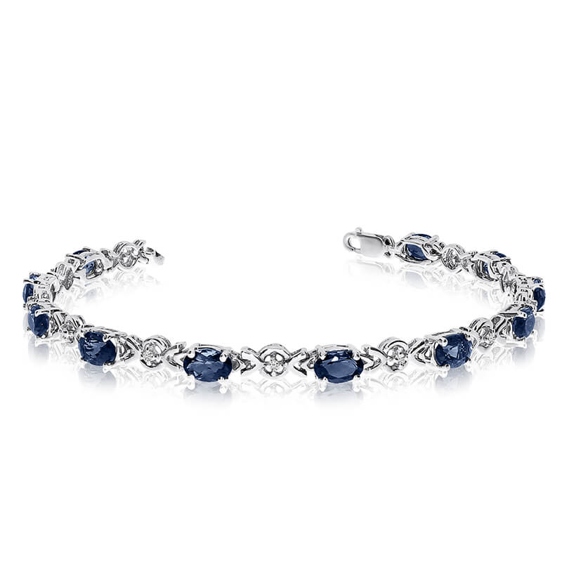 JCX3276: This 14k white gold oval sapphire and diamond bracelet features eleven 6x4 mm stunning natural sapphire stones with a 4.29 ct total gem weight.