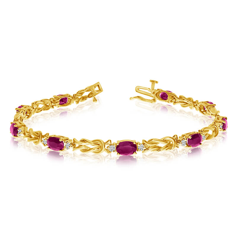 This 14k yellow gold natural ruby and diamond tennis bracelet features 9 oval rubys with a total gem weight of 3.24 carats and a total diamond weight of 0.5 carats.