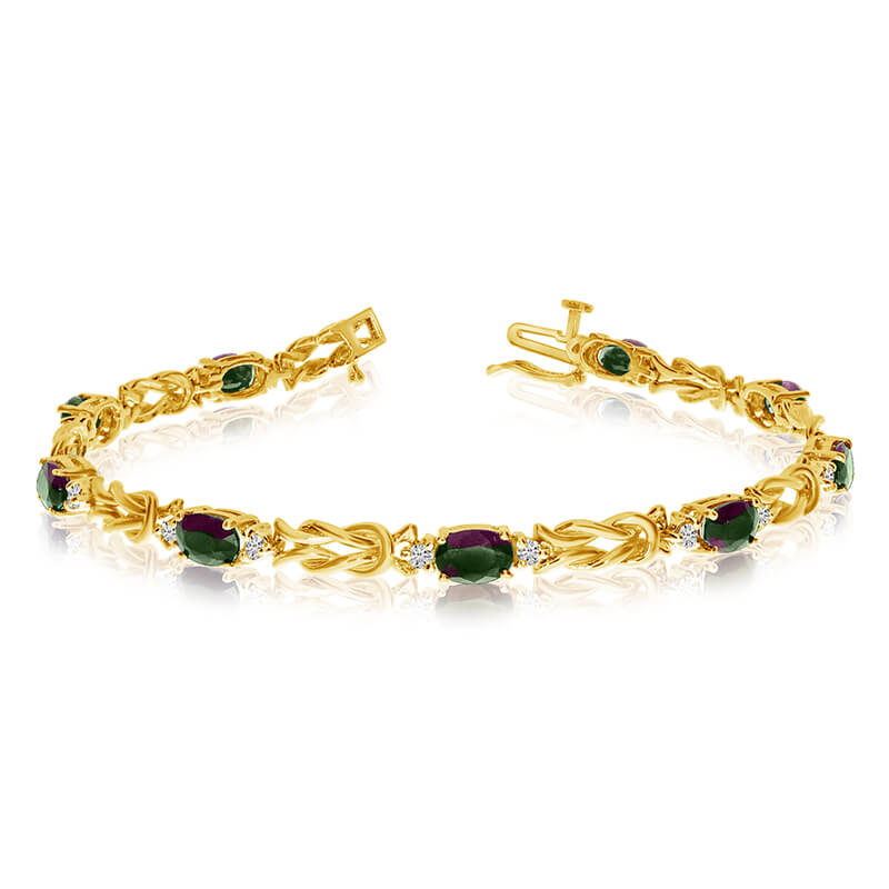 JCX3320: This 14k yellow gold natural mystic topaz and diamond tennis bracelet features 9 oval all natural mystic topaz. and a total diamond weight of 0.5 carats.