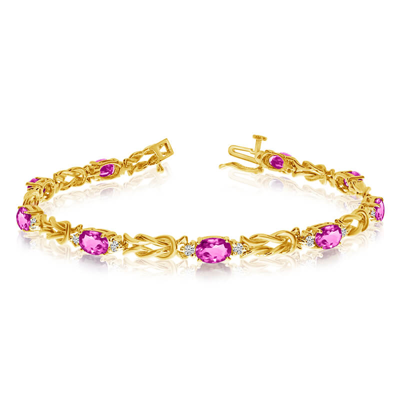 JCX3321: This 14k yellow gold natural pink-topaz and diamond tennis bracelet features 9 oval pink-topazs with a total gem weight of 3.87 carats and a total diamond weight of 0.5 carats.