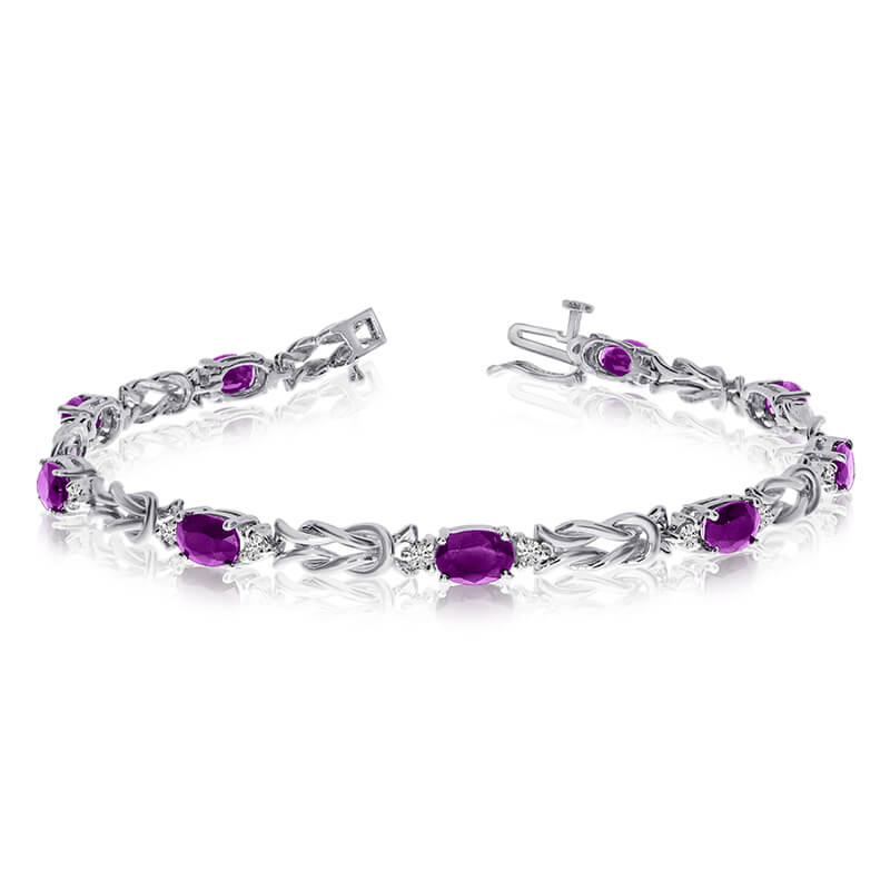 This 14k white gold natural amethyst and diamond tennis bracelet features 9 oval amethysts with a total gem weight of 3.06 carats and a total diamond weight of 0.5 carats.