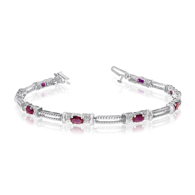 This 14k white gold natural ruby and diamond tennis bracelet features 8 oval rubys with a total gem weight of 1.44 carats and a total diamond weight of 0.16 carats.