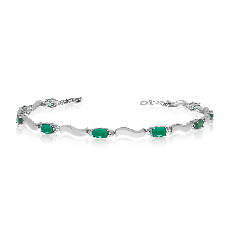 JCX3398: This 10K White Gold oval emerald and diamond bracelet features nine 5x3 mm stunning natural emerald stones with a 2.7 ct total gem weight.