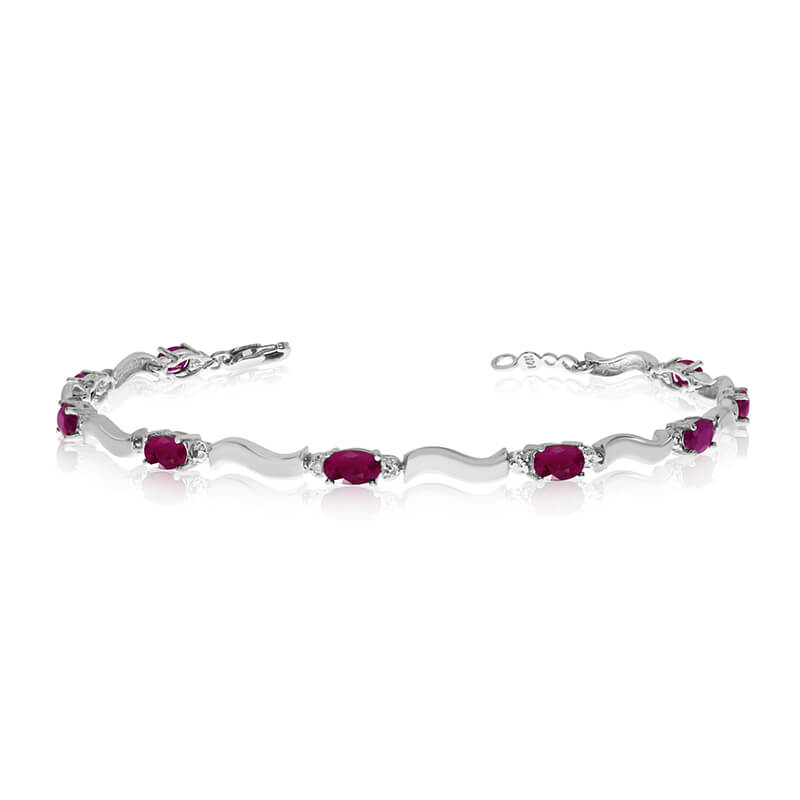 JCX3399: This 10K White Gold oval ruby and diamond bracelet features nine 5x3 mm stunning natural ruby stones with a 3.15 ct total gem weight.