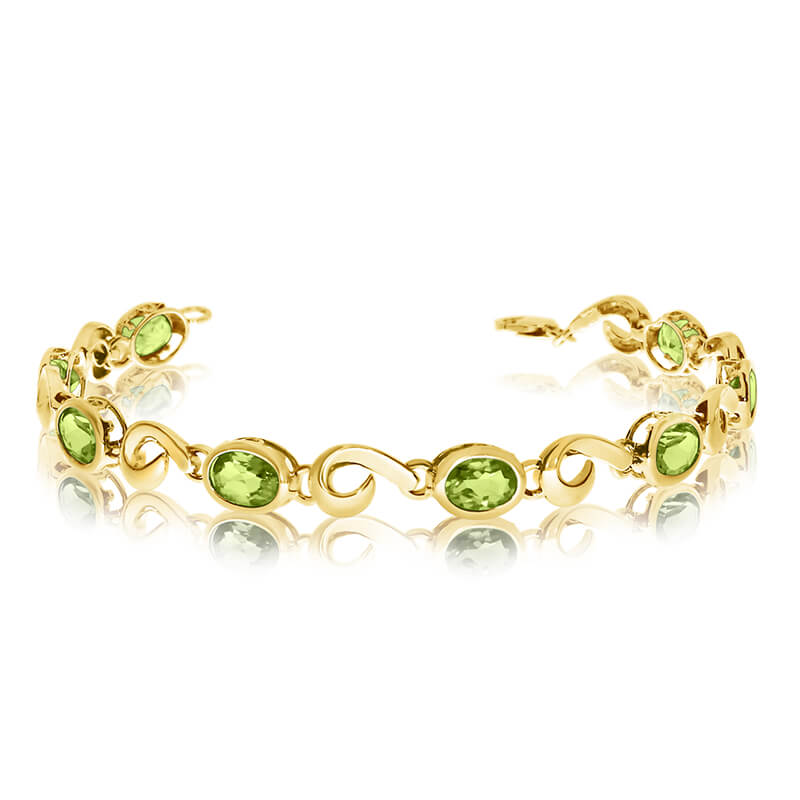 This 14k yellow gold oval peridot bracelet features 8 7x5 mm stunning natural peridot stones with a 5.36 ct total gem weight.
