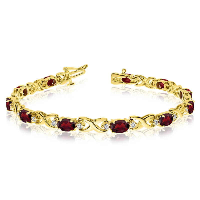 JCX3487: This 14k yellow gold natural garnet and diamond tennis bracelet features 11 oval garnets with a total gem weight of 5.17 carats and a total diamond weight of 0.4 carats.