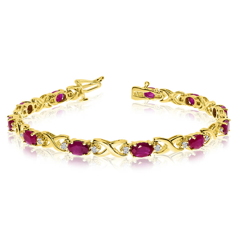 JCX3491: This 14k yellow gold natural ruby and diamond tennis bracelet features 11 oval rubys with a total gem weight of 3.96 carats and a total diamond weight of 0.4 carats.