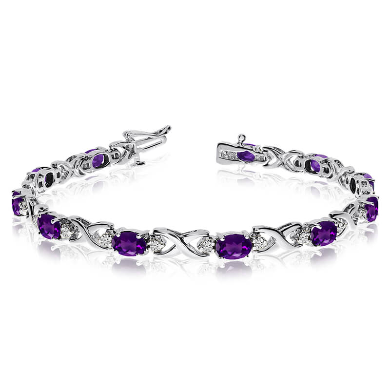 JCX3500: This 14k white gold natural amethyst and diamond tennis bracelet features 11 oval amethysts with a total gem weight of 3.74 carats and a total diamond weight of 0.4 carats.