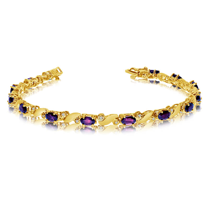 JCX3512: This 14k yellow gold natural amethyst and diamond tennis bracelet features 13 oval amethysts with a total gem weight of 2.34 carats and a total diamond weight of 0.15 carats.