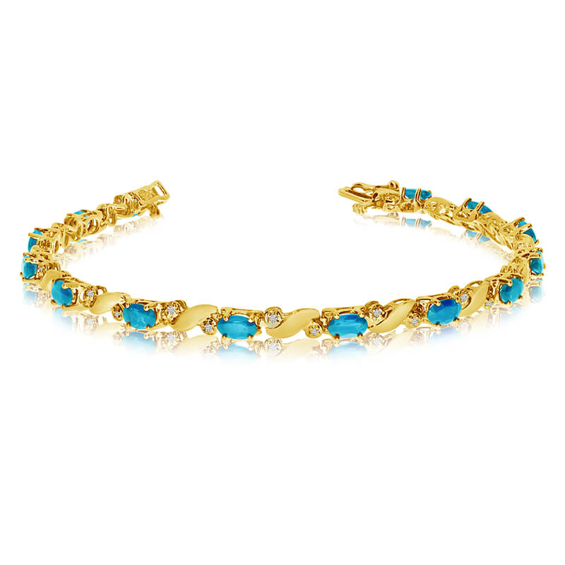 JCX3520: This 14k yellow gold natural blue-topaz and diamond tennis bracelet features 13 oval blue-topazs with a total gem weight of 2.47 carats and a total diamond weight of 0.15 carats.