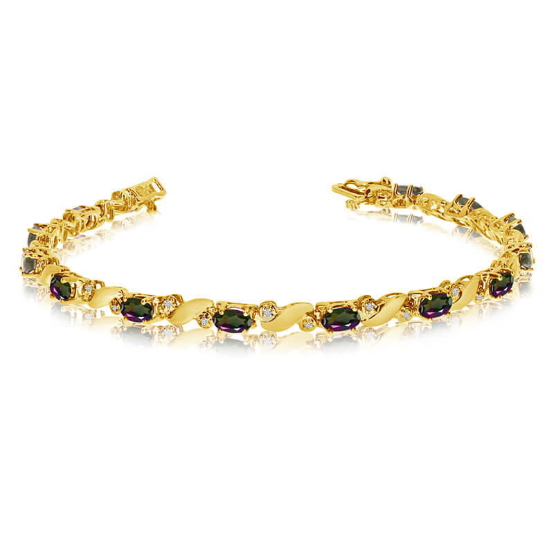 This 14k yellow gold natural mystic topaz and diamond tennis bracelet features 13 oval all natural mystic topaz. and a total diamond weight of 0.15 carats.