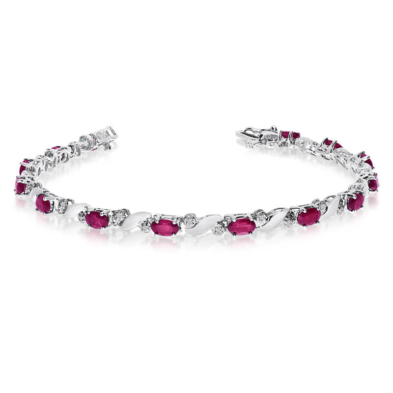 JCX3527: This 14k white gold natural ruby and diamond tennis bracelet features 13 oval rubys with a total gem weight of 2.34 carats and a total diamond weight of 0.15 carats.