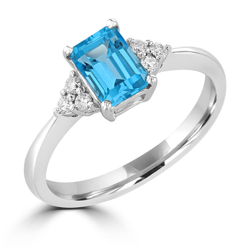 JCX391453: 5X7 EMERALD CUT BLUE TOPAZ WITH THREE DIAMONDS ON EACH SIDE RING