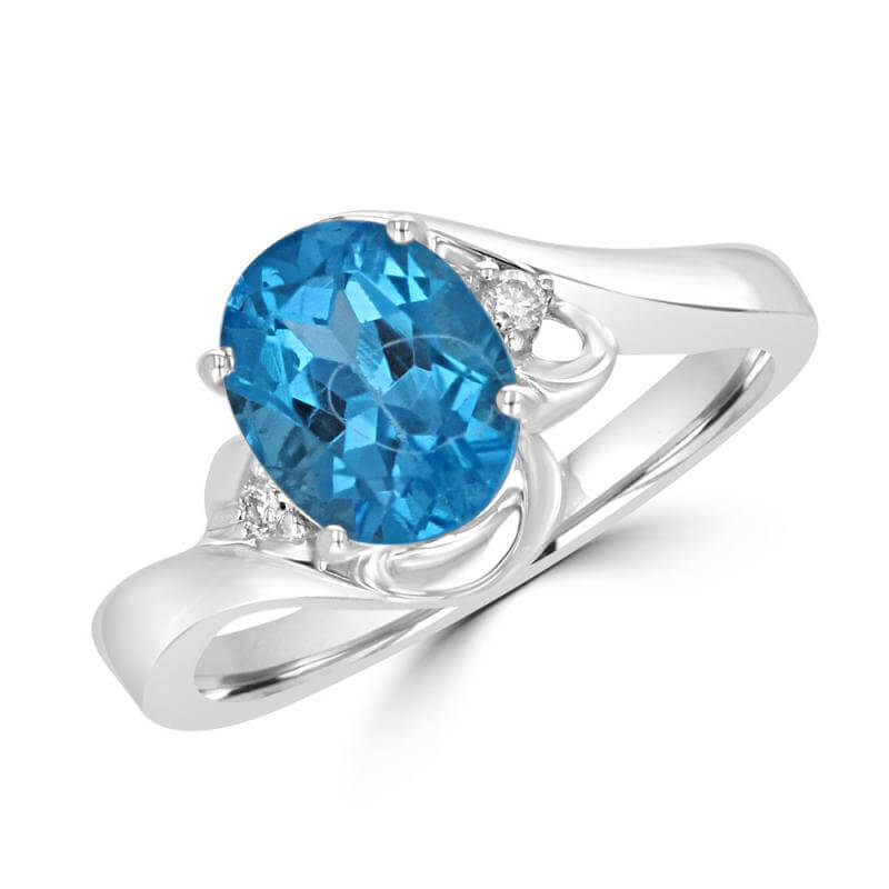 JCX391559: 7X9 OVAL BLUE TOPAZ & ONE DIAMOND EACH SIDE RING