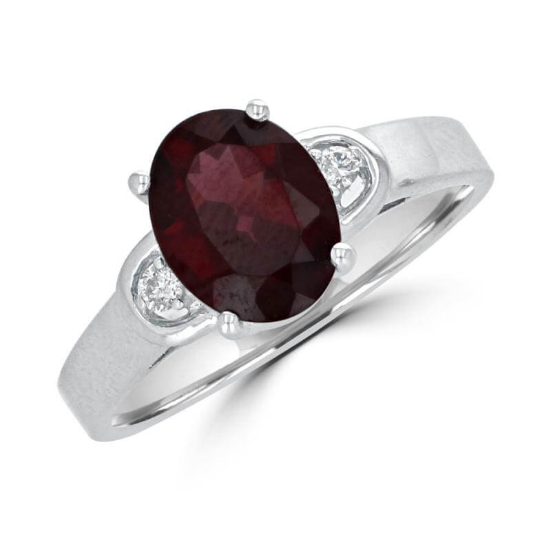 7x9 OVAL GARNET AND DIAMOND ON EACH SIDE RING