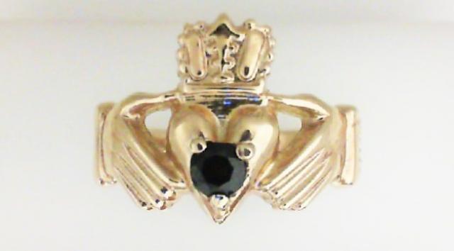 JCSJCS1423: Men&#39;s 14 karat yellow gold claddagh ring with a garnet stone.

Size: 9.25