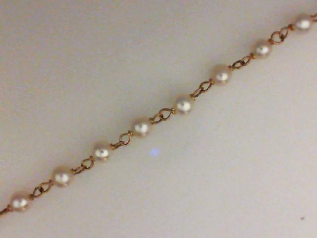 JCSJCS1417: Ladies 14 karat yellow gold pearl anklet bracelet.