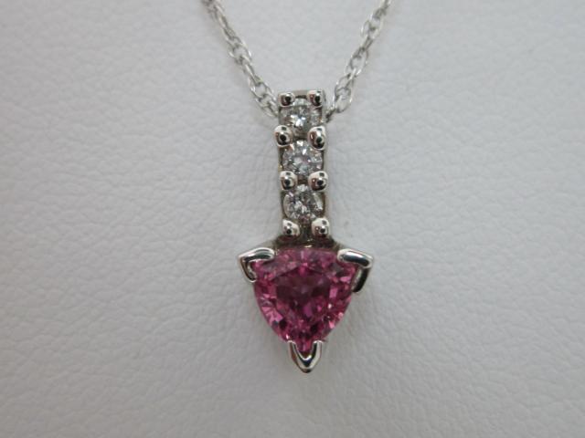 JCSJCS1028: This 14kt white gold Pink Sapphire gemstone pendant contains three accent diamonds.  A perfect gift for the month of October! STOP IN TO SEE THE NEW PRICE